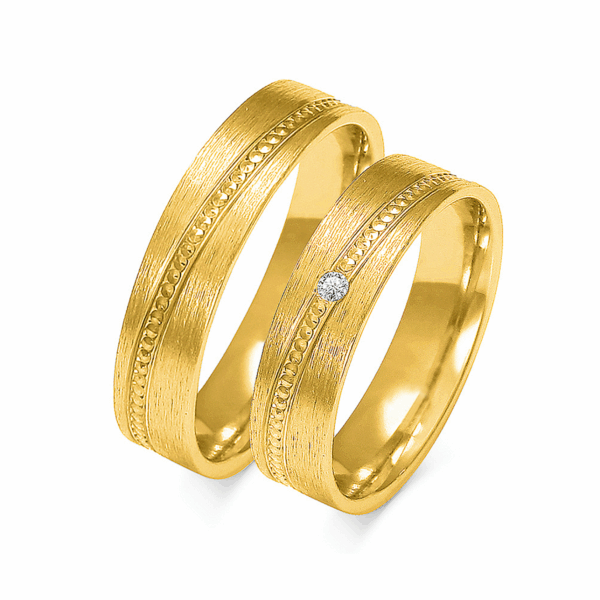 Obrączki z żółtego złota z brylantem i cyrkonią