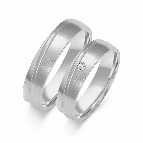 Obrączki z białego złota z cyrkoniami i brylantem