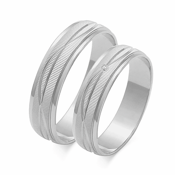 Obrączki z białego złota z cyrkoniami i brylantem