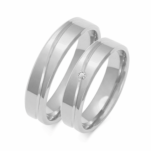 Obrączki z białego złota z cyrkoniami i brylantem