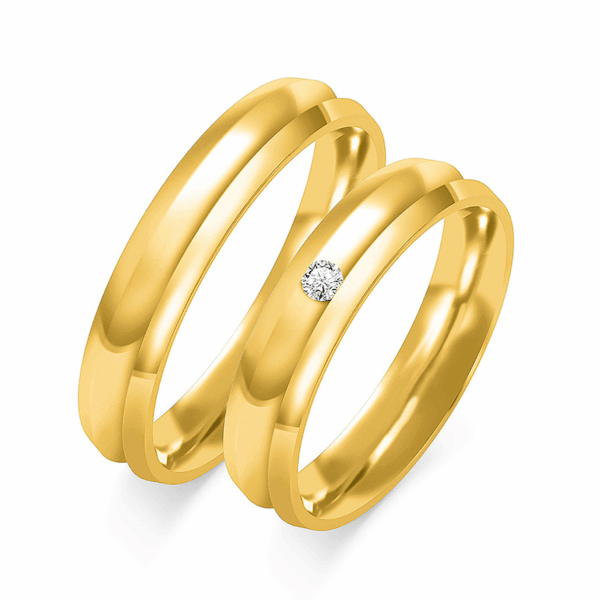 Obrączki z żółtego złota z cyrkoniami i brylantem