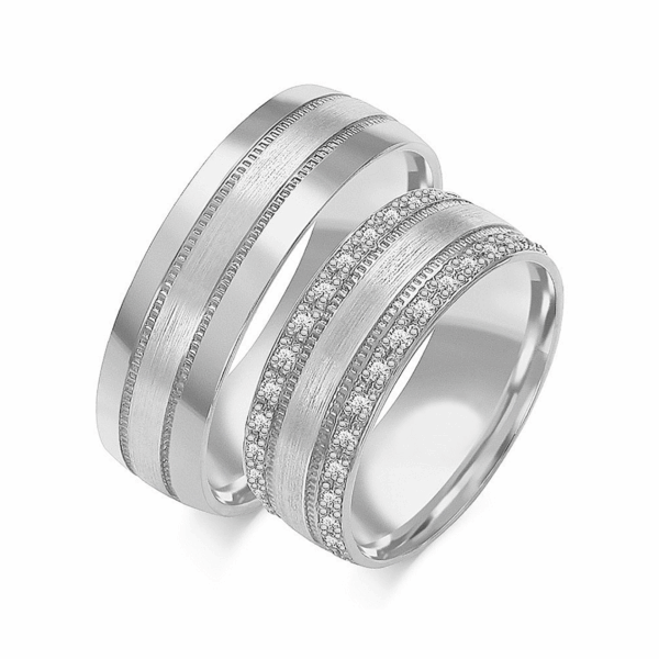 Obrączki z białego złota z cyrkoniami i brylantem