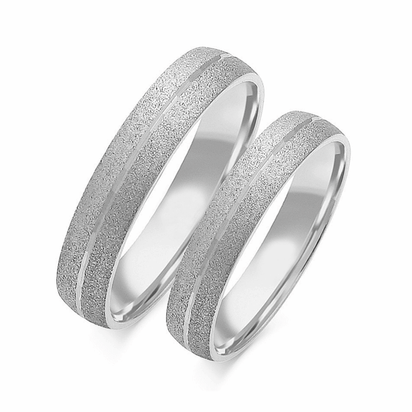 Obrączki z białego złota z cyrkoniami i brylantem