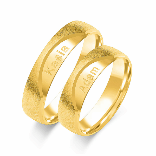 Obrączki z żółtego złota z cyrkoniami i brylantem