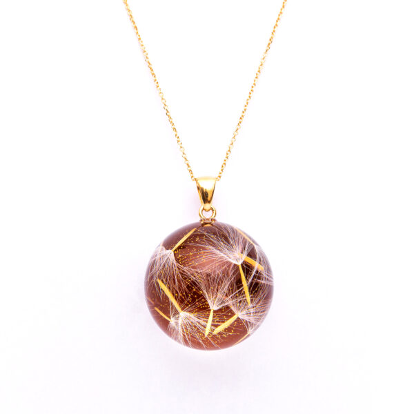 Naszyjnik z kamieniem słonecznym i nasionami dmuchawca zatopionymi w żywicy