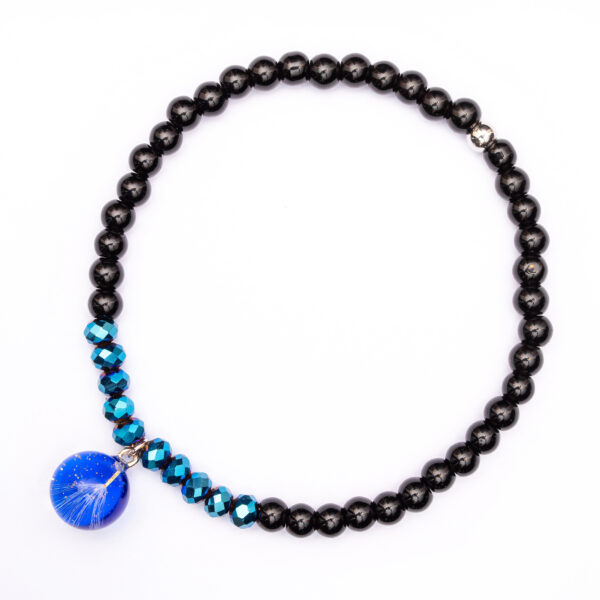 Bransoletka z obsydianem i nasionami dmuchawca zatopionymi w żywicy