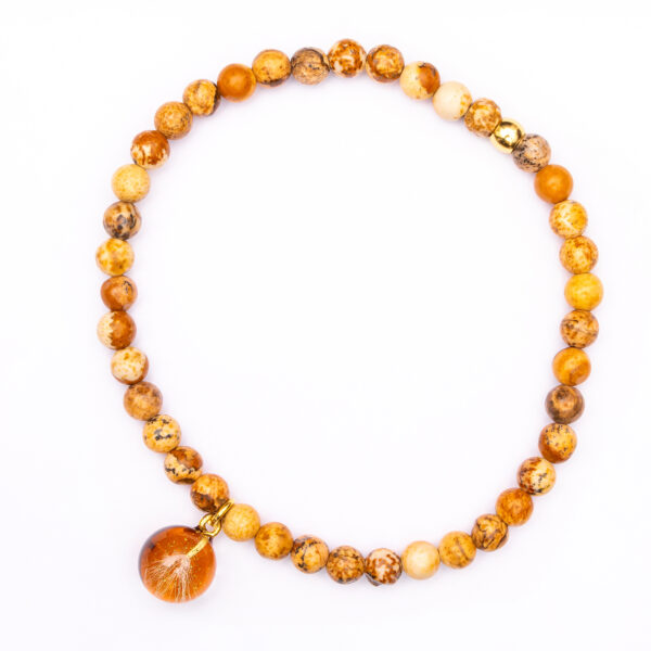 Bransoletka z jaspisem i nasionami dmuchawca zatopionymi w żywicy